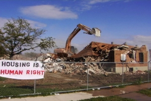 New-Orleans-home-demolition-sign-Housing-is-a-Human-Right1